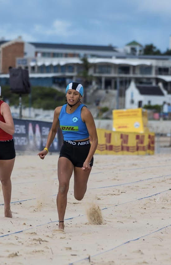 Bioteen Sponsored Athlete competing on beach for Lifesaving